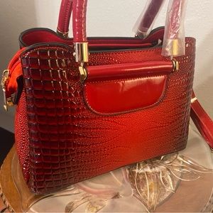 This is a beautiful two tones purse very elegant style its crossbody too